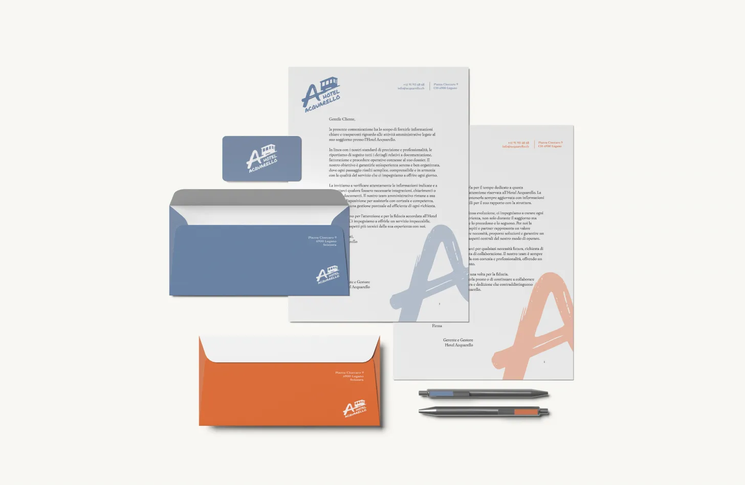 Hotel Acquarello, full stationery: letterhead, blue and orange envelopes, pen and sheets with the A logo and funicular