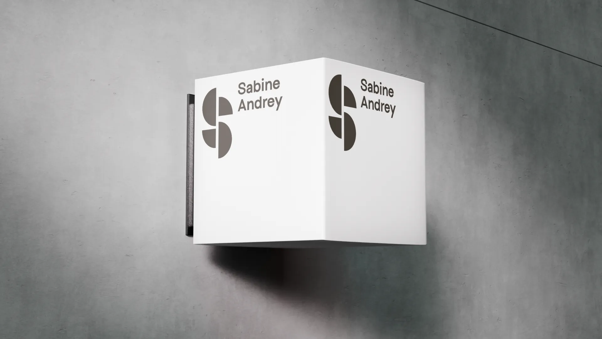 Studio Sabine Andrey, mockup of the illuminated cube sign above the studio entrance